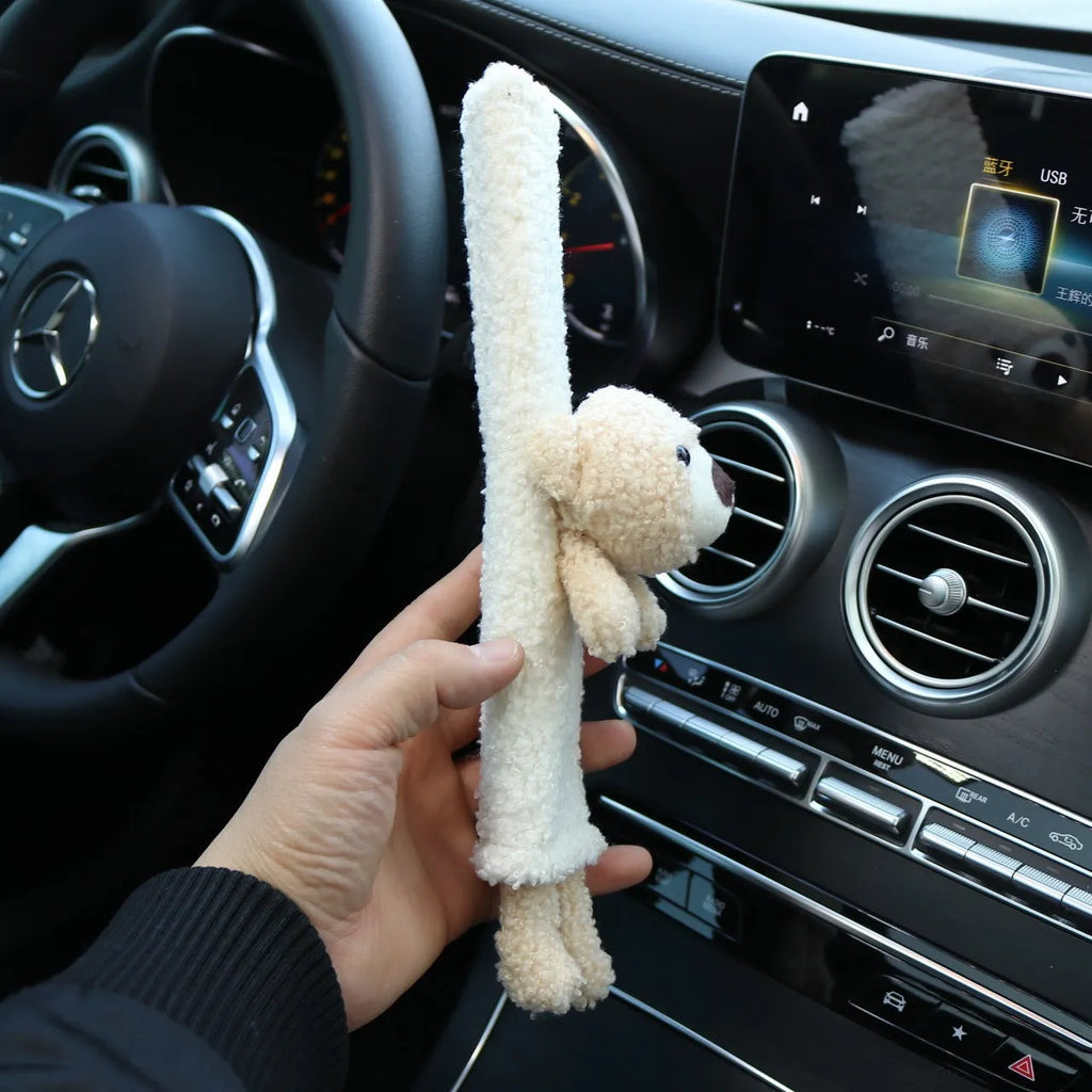 Cartoon plush lamb's wool shoulder protector for car seat belt in rabbit and bear designs.