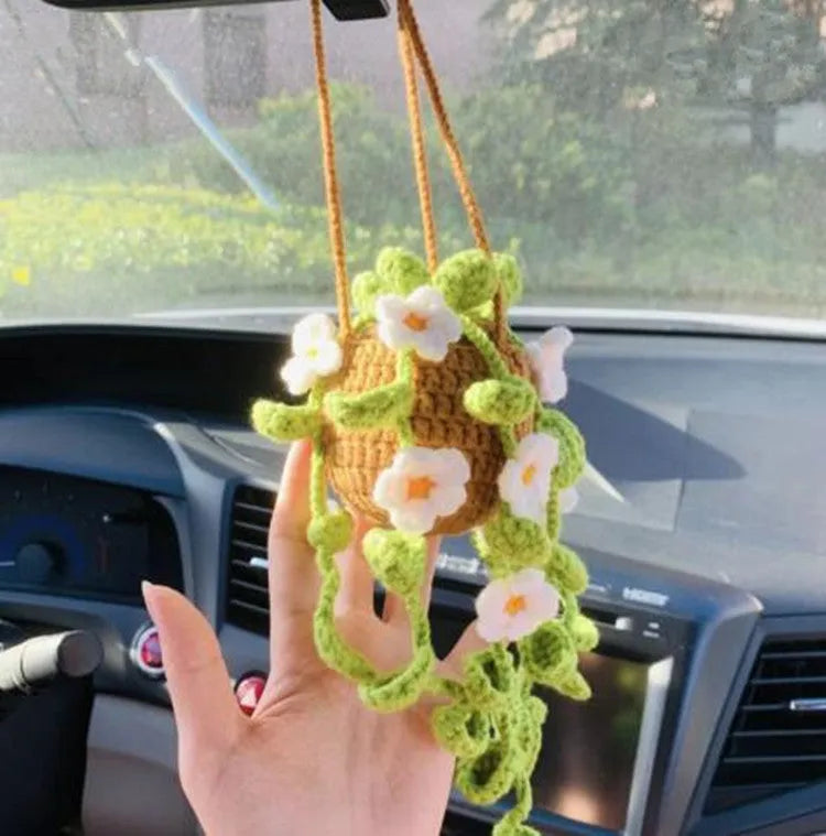 Green and white knitted wool plant ornament for car dashboard with hanging cord