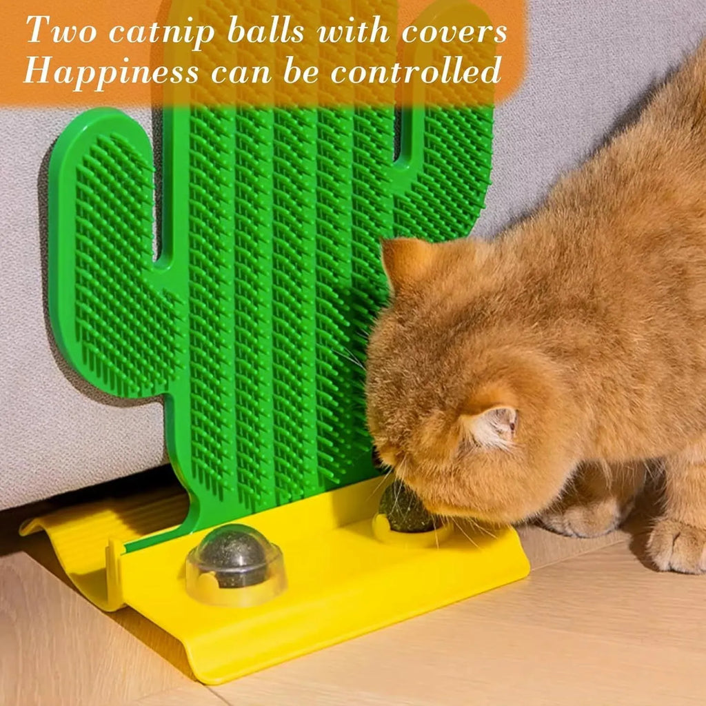 Green cactus-shaped cat self groomer with two catnip balls attached to a wall corner
