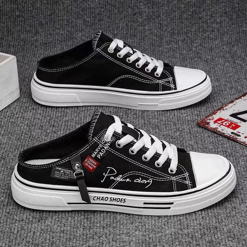 Men's canvas slip-on shoes in black with round toe and PVC sole