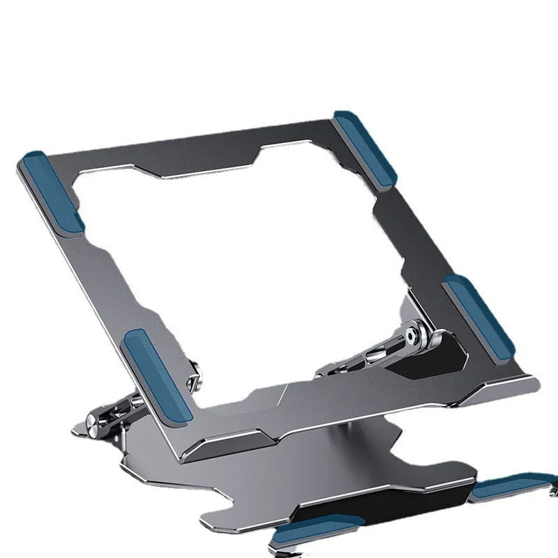 Grey aluminium laptop stand folded flat next to an open laptop, showing its adjustable angle and hollow design.