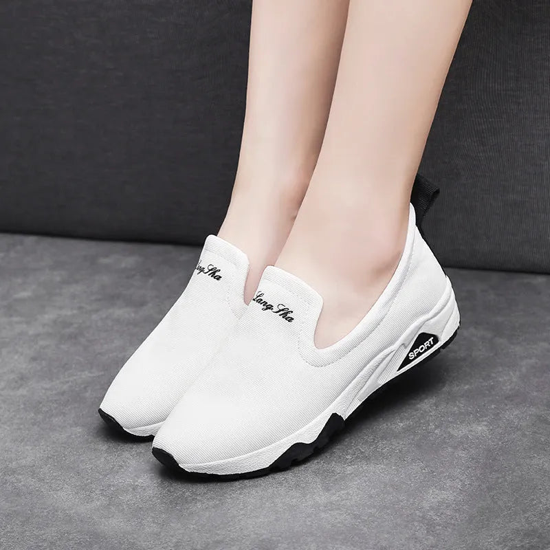Women canvas shoes with leather toe cap and super high heel in white, blue, red, and black colour options