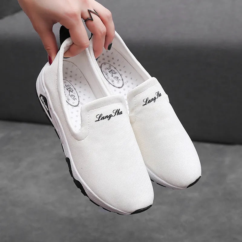 Women canvas shoes with leather toe cap and super high heel in white, blue, red, and black colour options