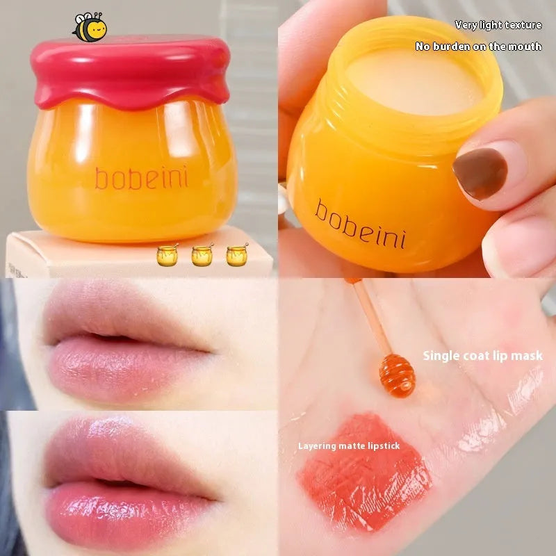 Vaseline Moisturising Lip Balm pot in blueberry or pomegranate flavour, 9g net content with applicator brush.