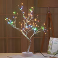 Tree light night light with bonsai-style design, warm white LED lights, adjustable branches, and USB plug.