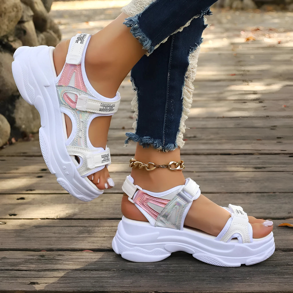 Women's white Roman platform sports sandals with PU upper and rubber sole showing side profile