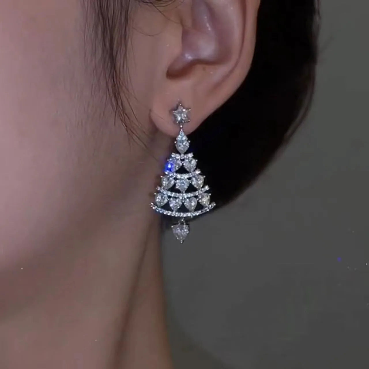 Women's silver needle Christmas tree earrings in geometric shape with bell motif, available in gold or silver