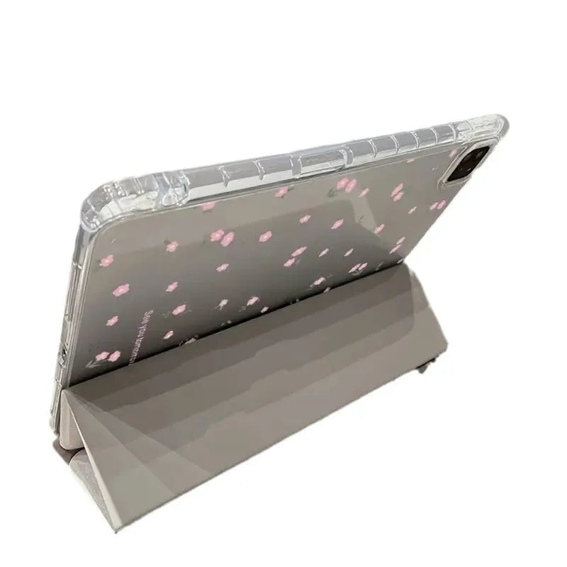 Transparent floral tri-fold protective case for Apple iPad tablet showing clear front and built-in stand