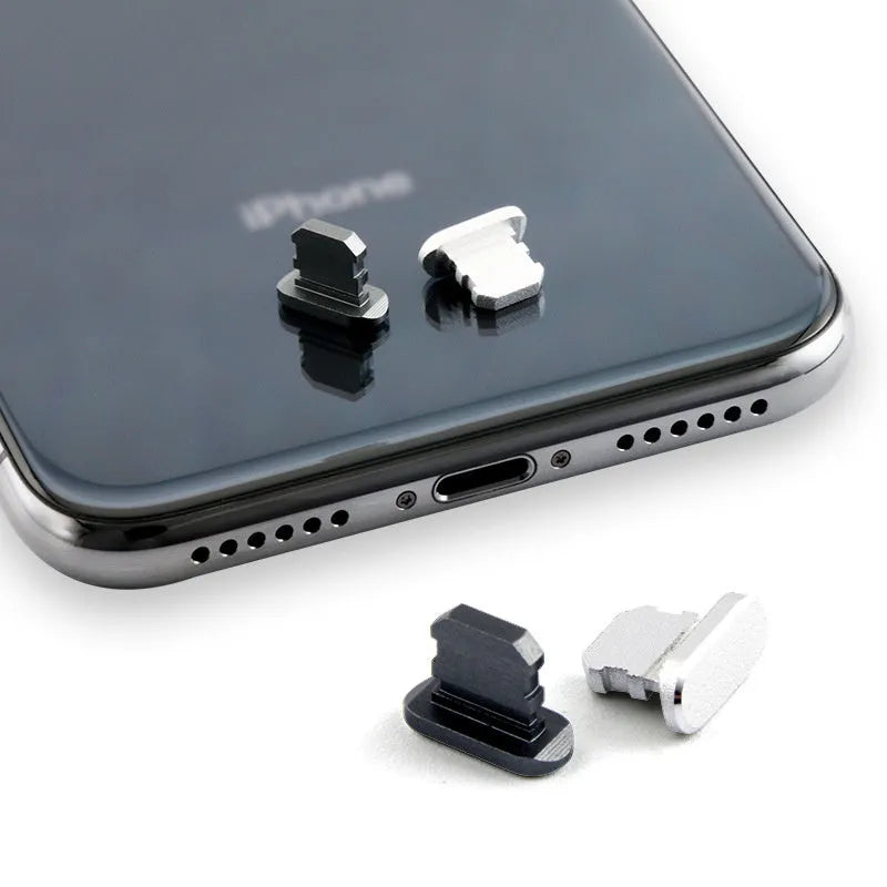Aluminium alloy dust plug for iPhone charging port in various colours including gold and black.