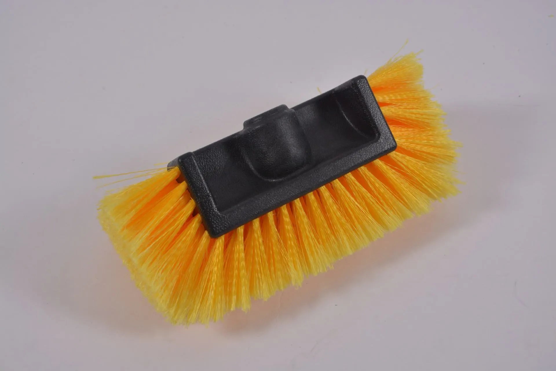 Yellow portable car wash brush with four-section removable rod and flow-through brush head