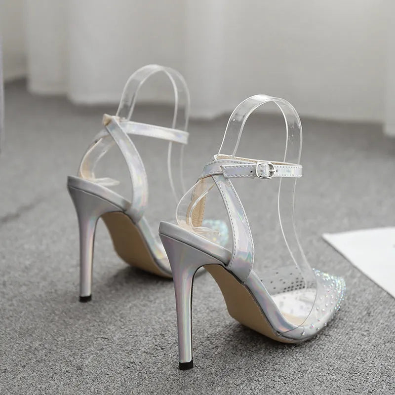 Women's pointed toe sandals with diamond pattern and stiletto heel on a white background.