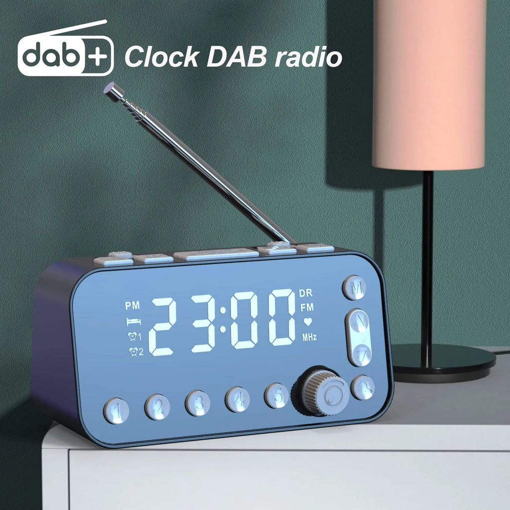 Black DAB bedside alarm clock with LED display, control buttons, pig tail antenna and USB ports