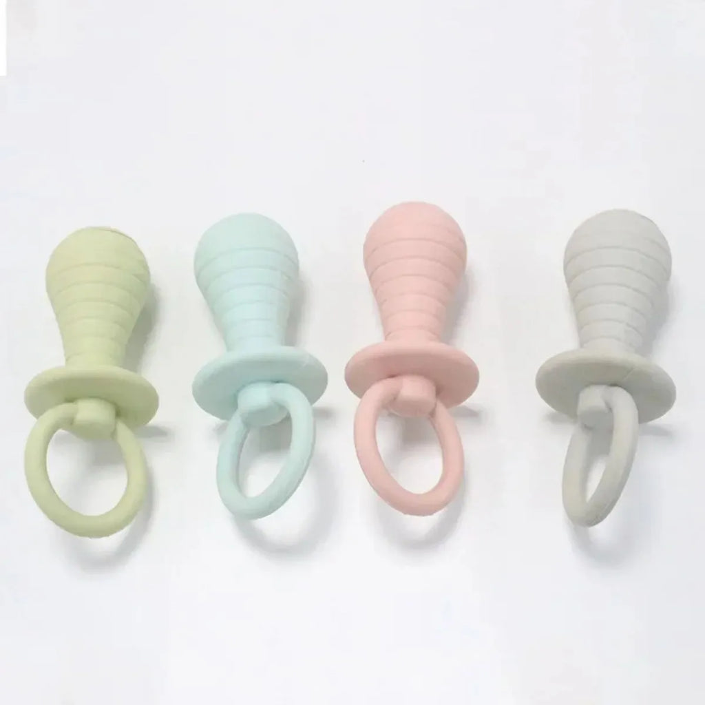 Set of four coloured TPR rubber pacifier chew toys for puppies and kittens on a white background.