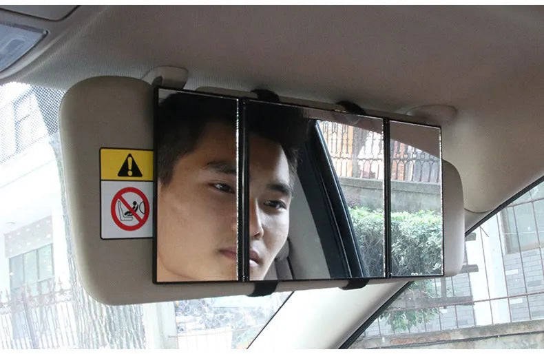 Silver car folding makeup mirror shown closed at 15.5cm and opened to 30.5cm wide.