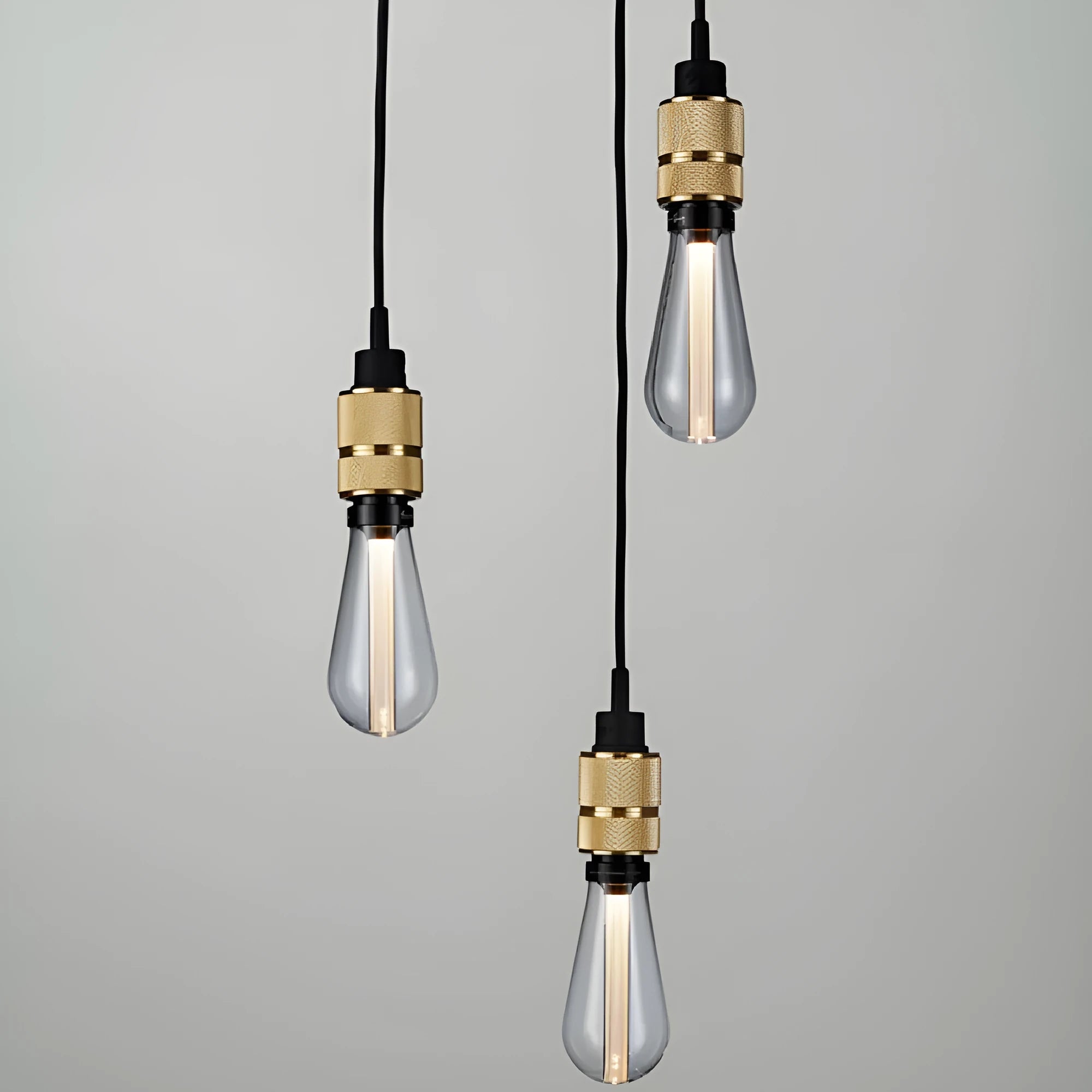 DIY retro chandelier assembly components showing braided cord and electroplated lamp holder in chrome finish