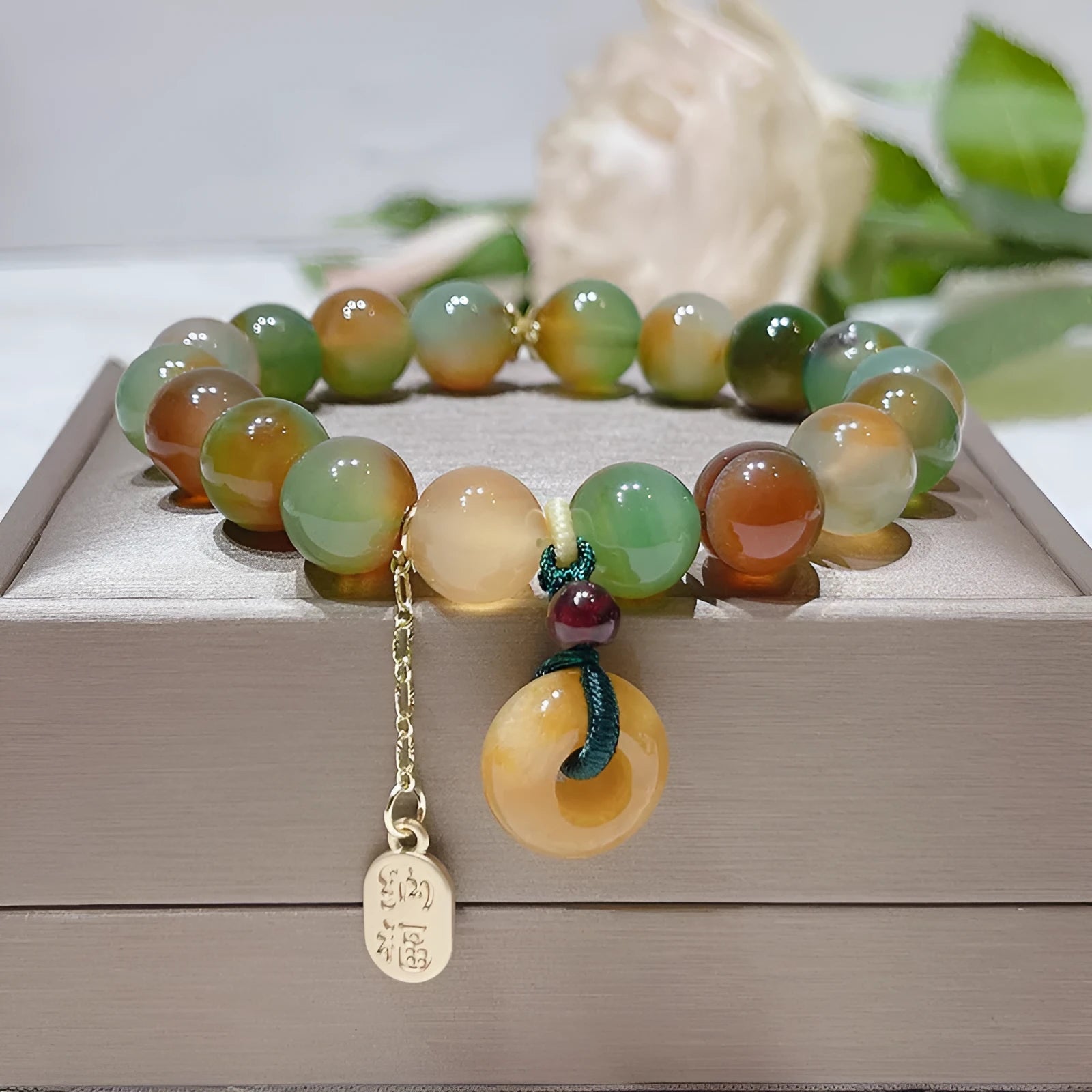 Yellow peacock agate women's bracelet with peace buckle closure measuring 1cm wide