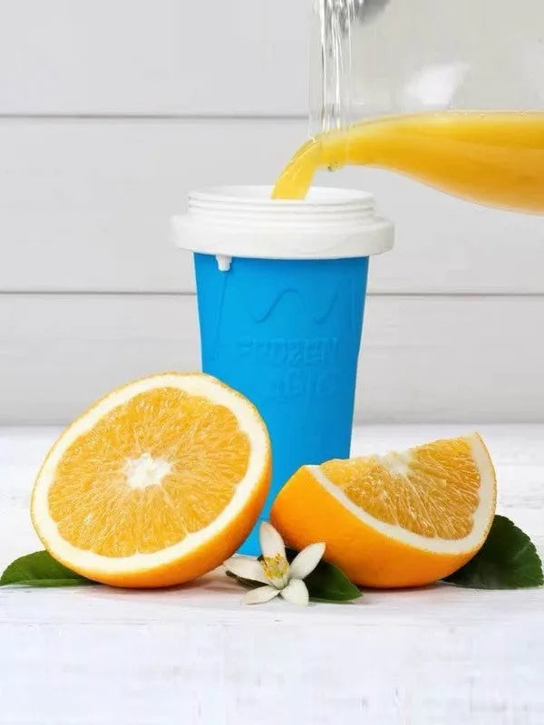 Blue silicone quick refrigeration pinch cup for making slushies, showing cylindrical shape.
