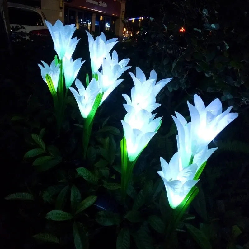 Solar-powered flower-shaped garden light with LED colour changing bulbs