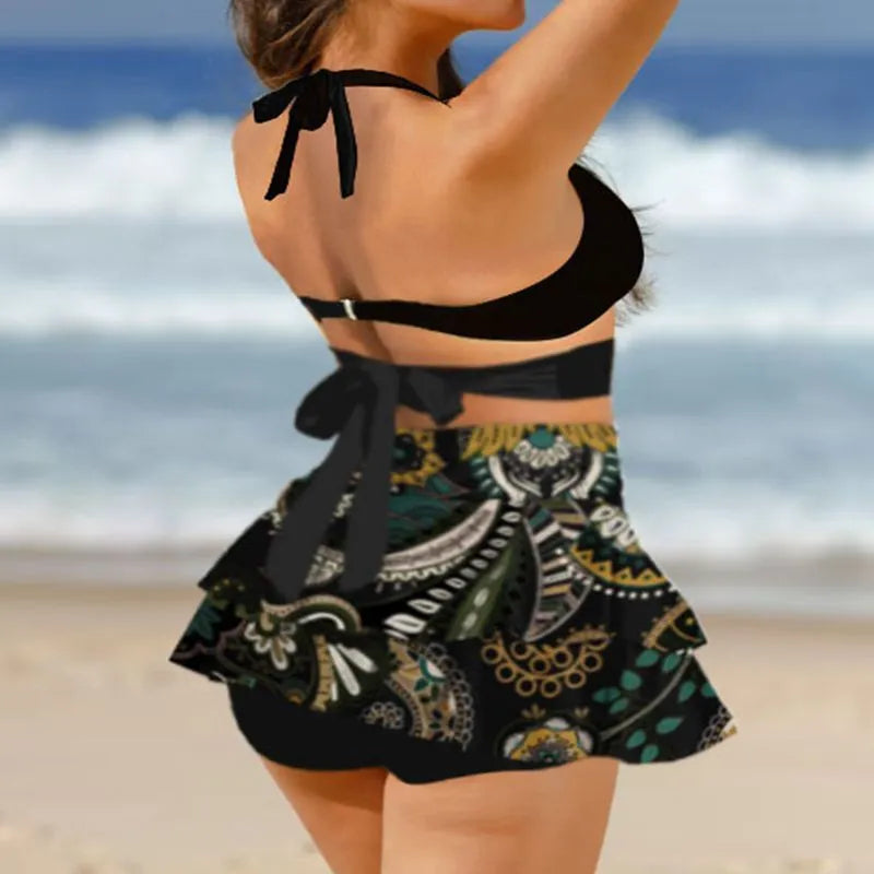 Women's purple lace-up bikini top and matching split skirt swimsuit set.
