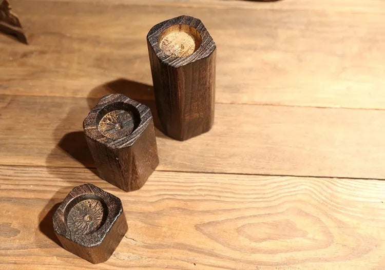 Three solid wood candle holders in natural paulownia wood charcoal-fired finish sizes small medium large