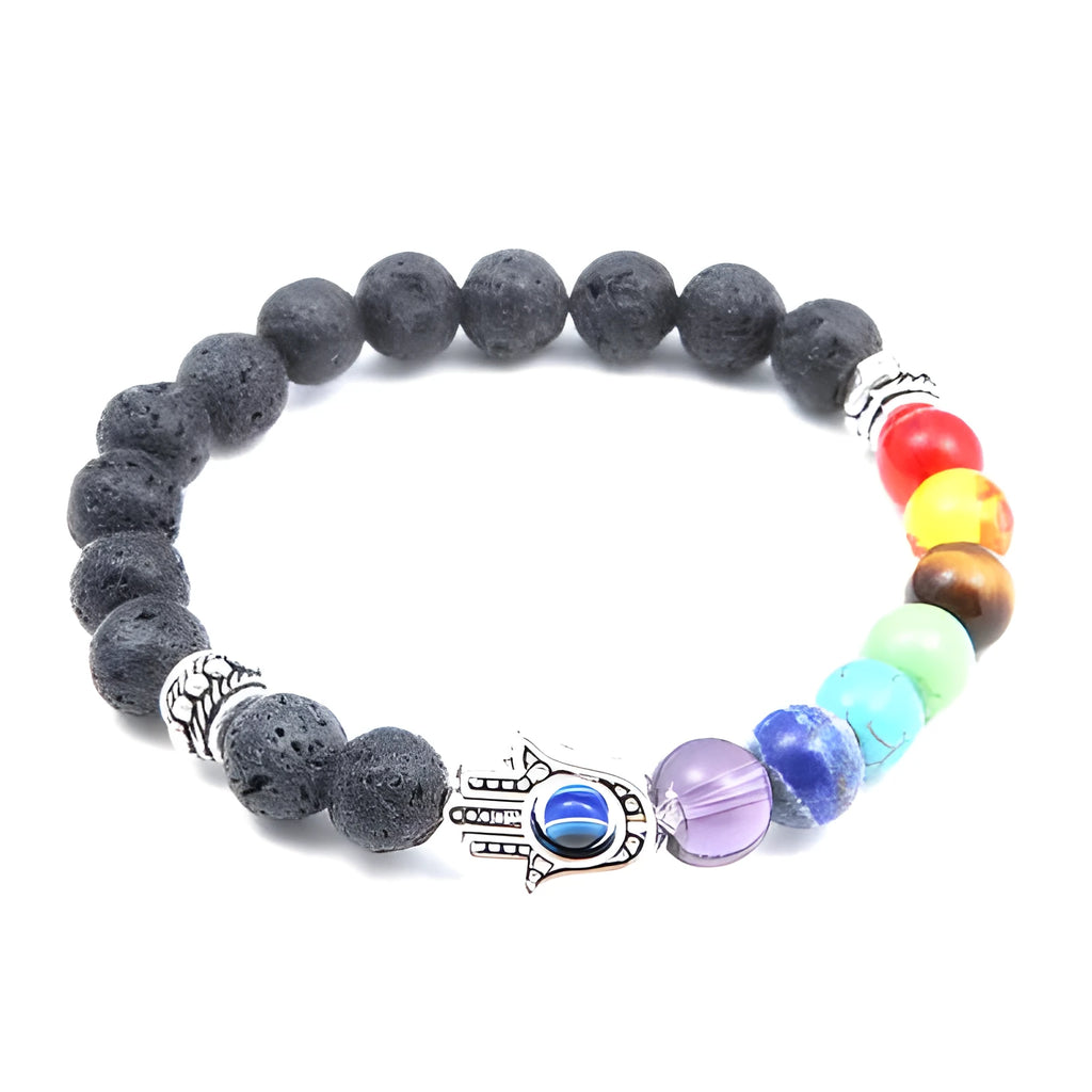 Volcanic rock and blue eyes palm seven chakra hand chain on a neutral background