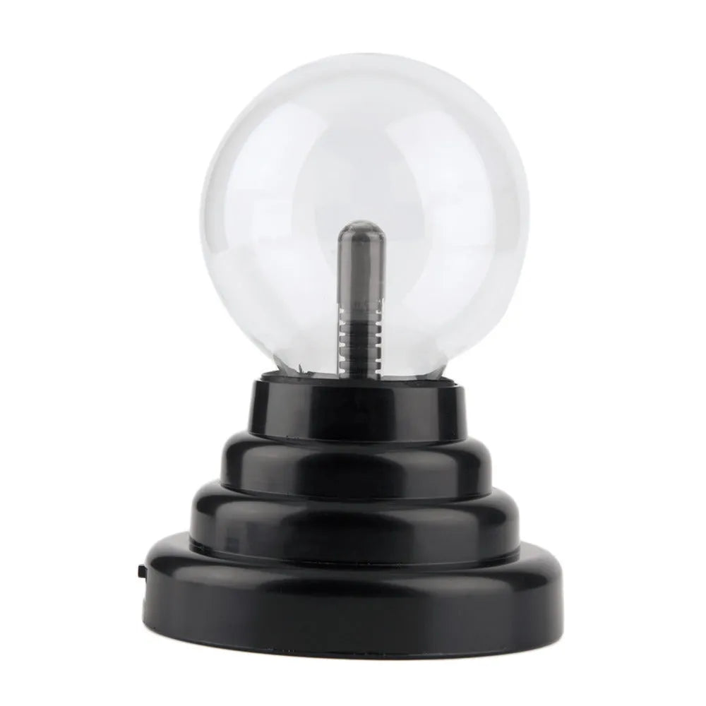 Colourful magic ball light with 7.62cm glass sphere on ABS base and USB cable