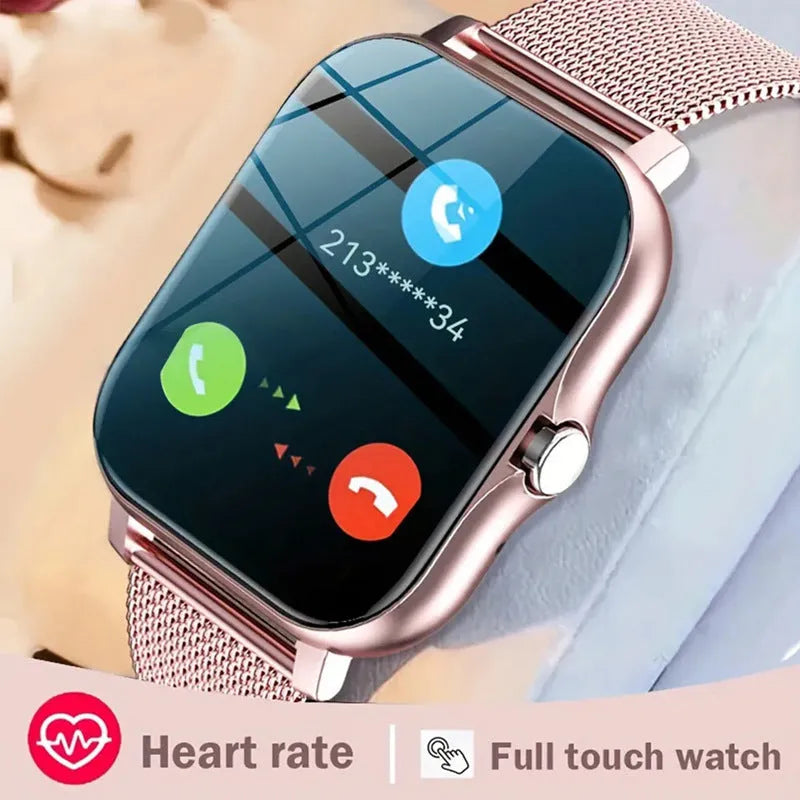 Black and gold smart watch with 1.44-inch touch screen and silicone strap on a wrist