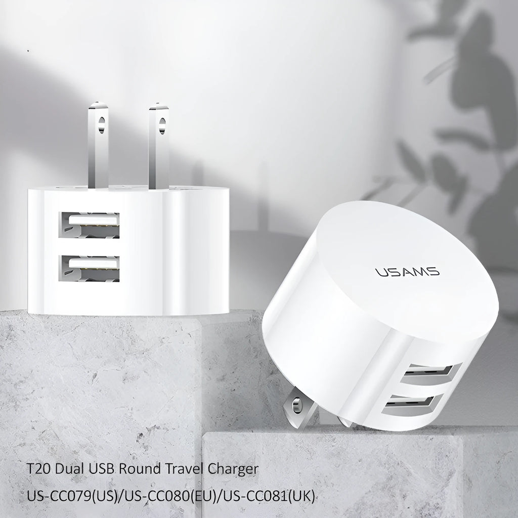 White portable universal dual USB phone charger with US, EU, and UK plug types.