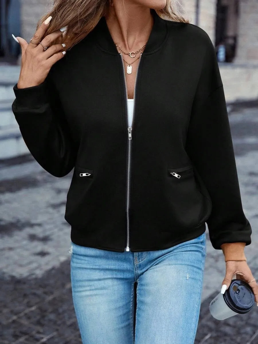 Black women's casual zip-up jacket with long sleeves and faux pockets