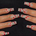 Pack of 24 red French love themed nail art stickers with small cherry and diamond designs, includes glue.