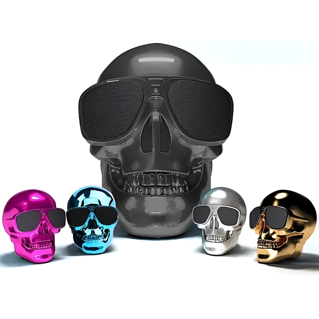 Skull-shaped wireless Bluetooth speaker with rechargeable battery showing front detail and colour options