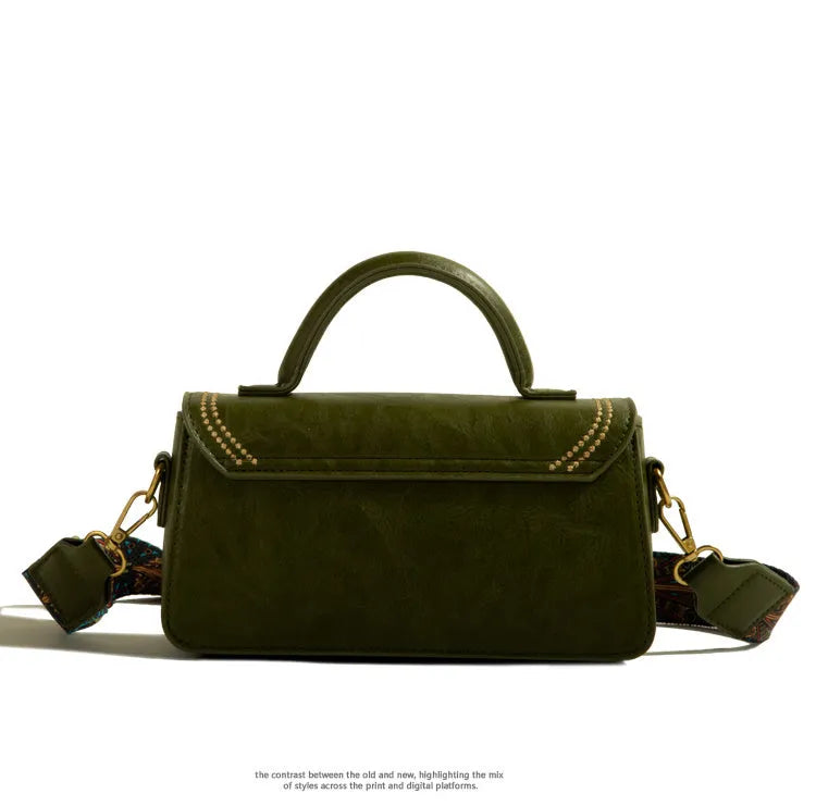 Retro women's messenger bag in square vertical design with organised interior compartments