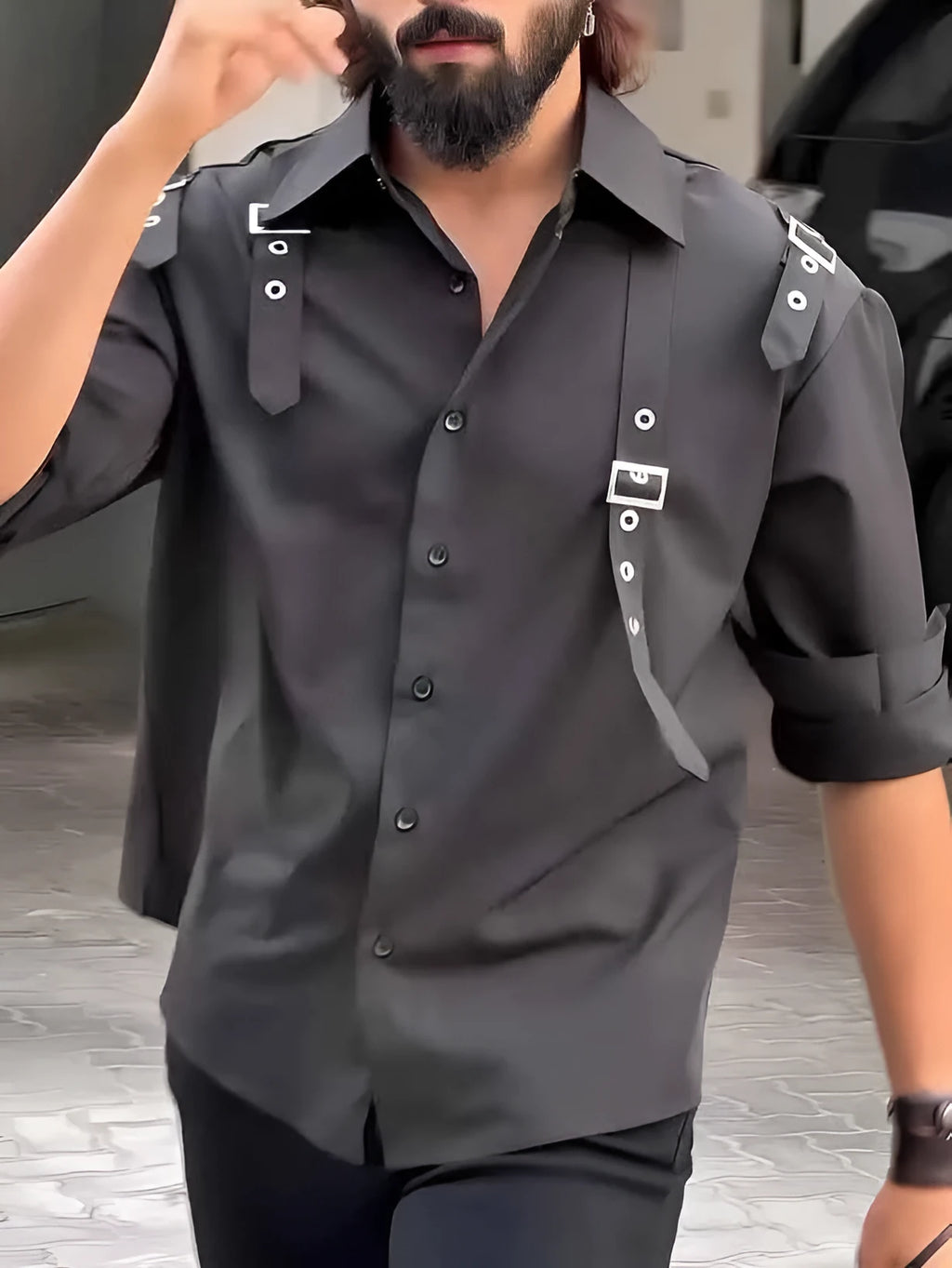 Black men's utility-style button-up shirt with a regular fit on a mannequin.
