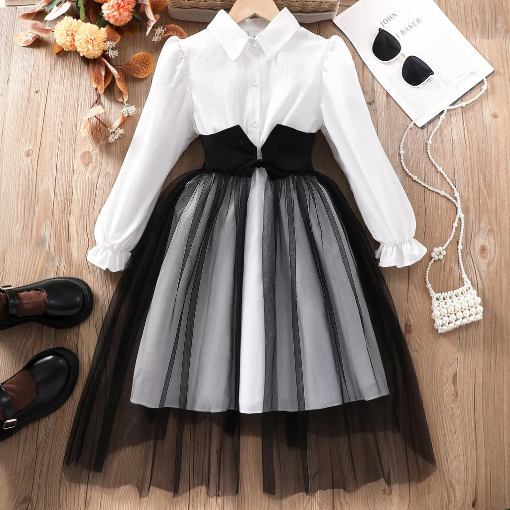 Girls mesh stitching dress in solid colour polyester, available in black and brown for heights 8Y to 12Y