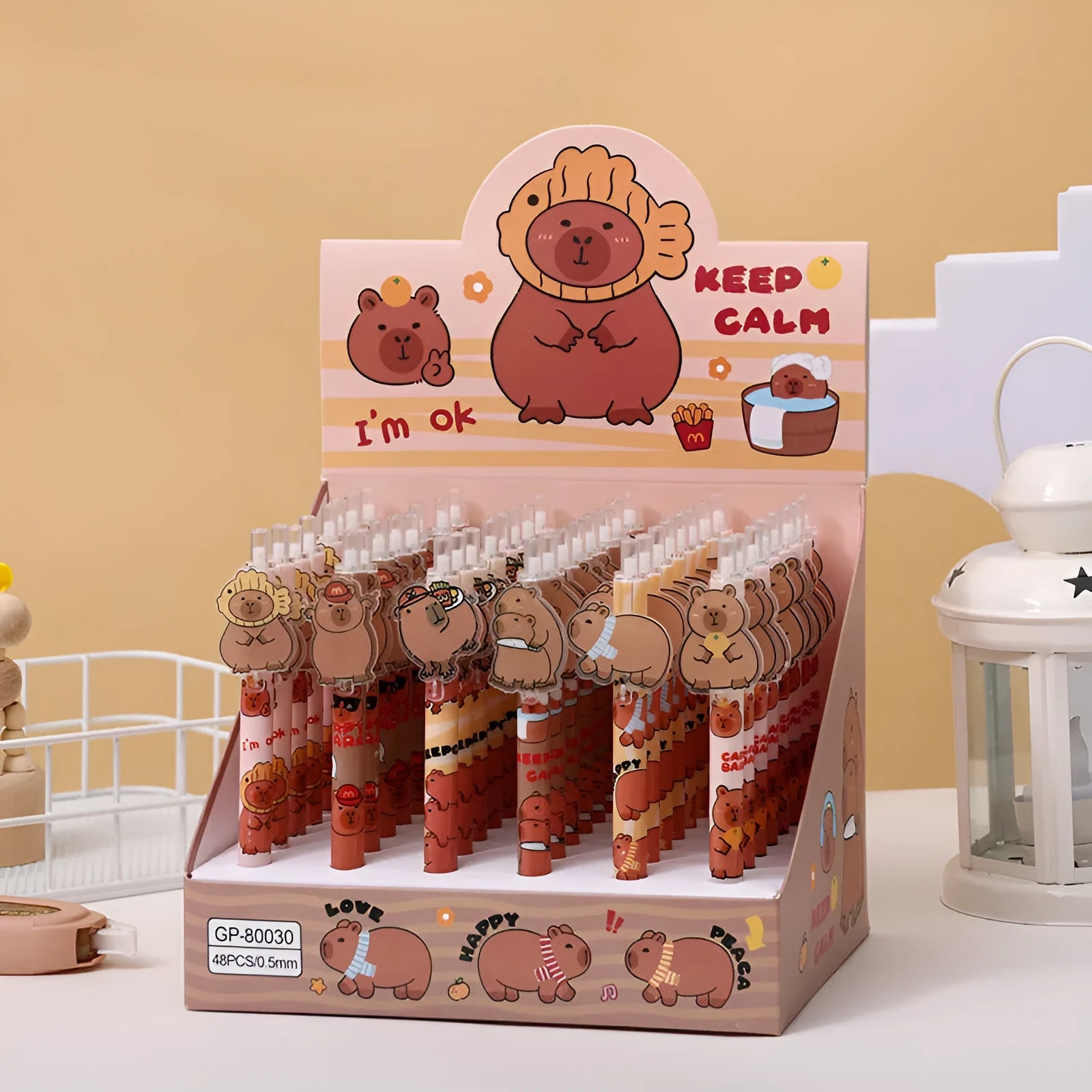 Box of 48 cartoon bear design gel pens with plastic bodies and carbon black ink.