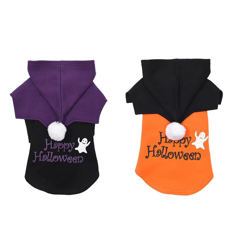 Halloween pumpkin-themed dog sweater with attached shawl in black and orange colours