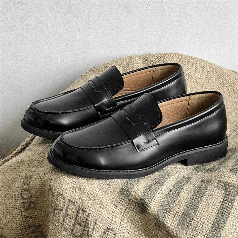 Men's black slip-on Derby leather shoes with a Microfiber upper and rubber sole.