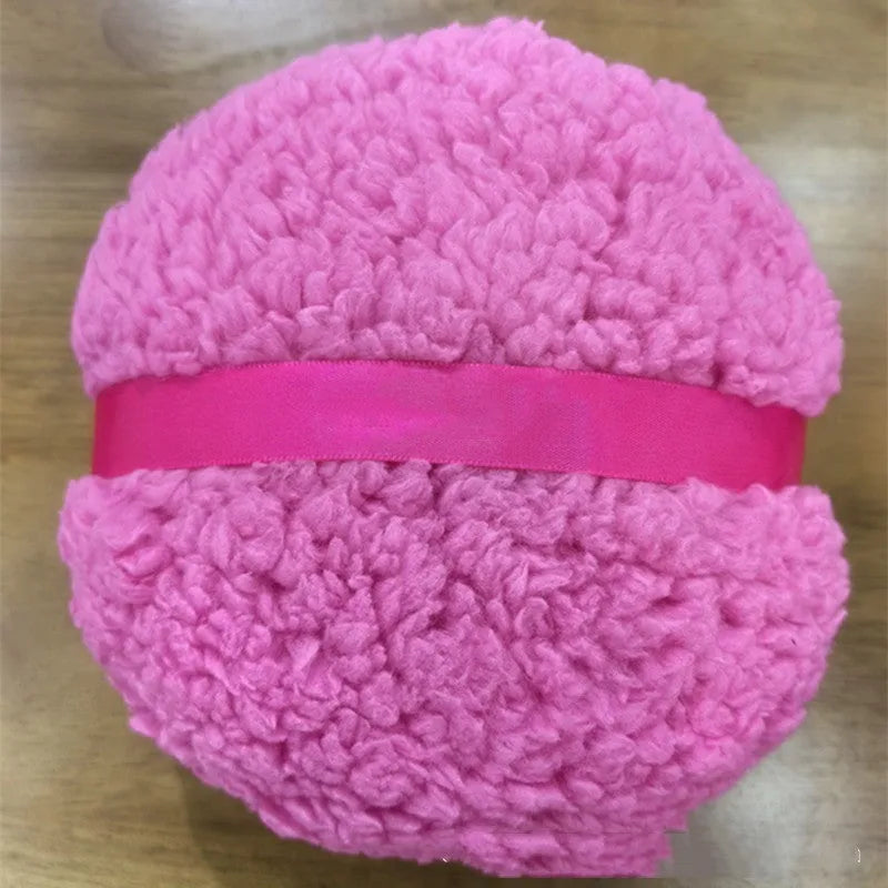 Oversized rectangular plush powder puff for makeup in white, pink, or skin colour on a 150x75mm size scale.
