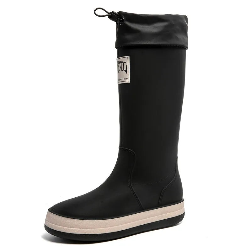 Unisex PVC platform rain boots in beige, featuring a high tube design and non-slip sole.
