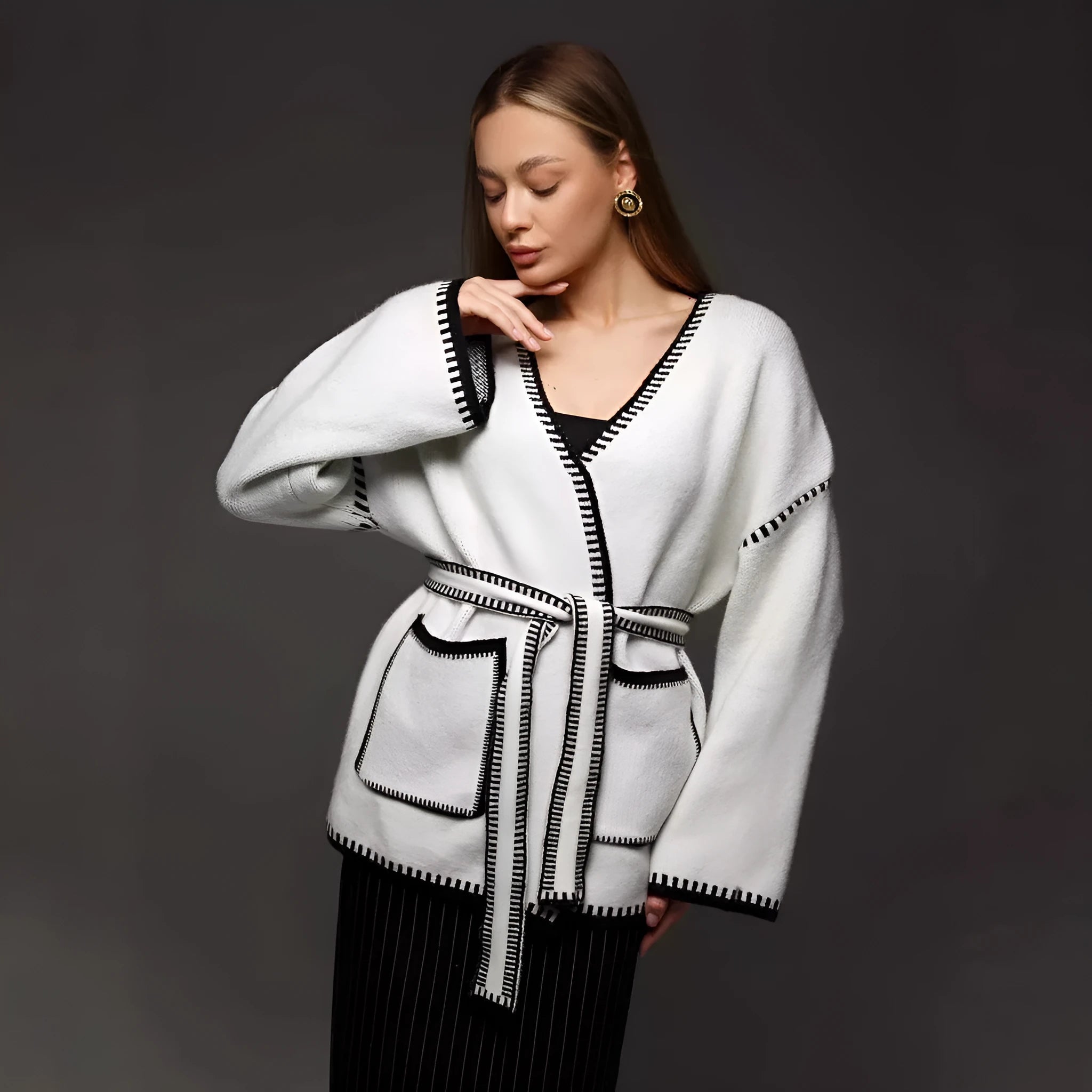 Loose lace-up knitted cardigan sweater coat in imitation cashmere, shown in camel colour