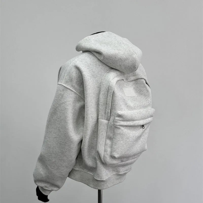Light grey men's hoodie with a schoolbag design on the back, showing the hood and front zip.