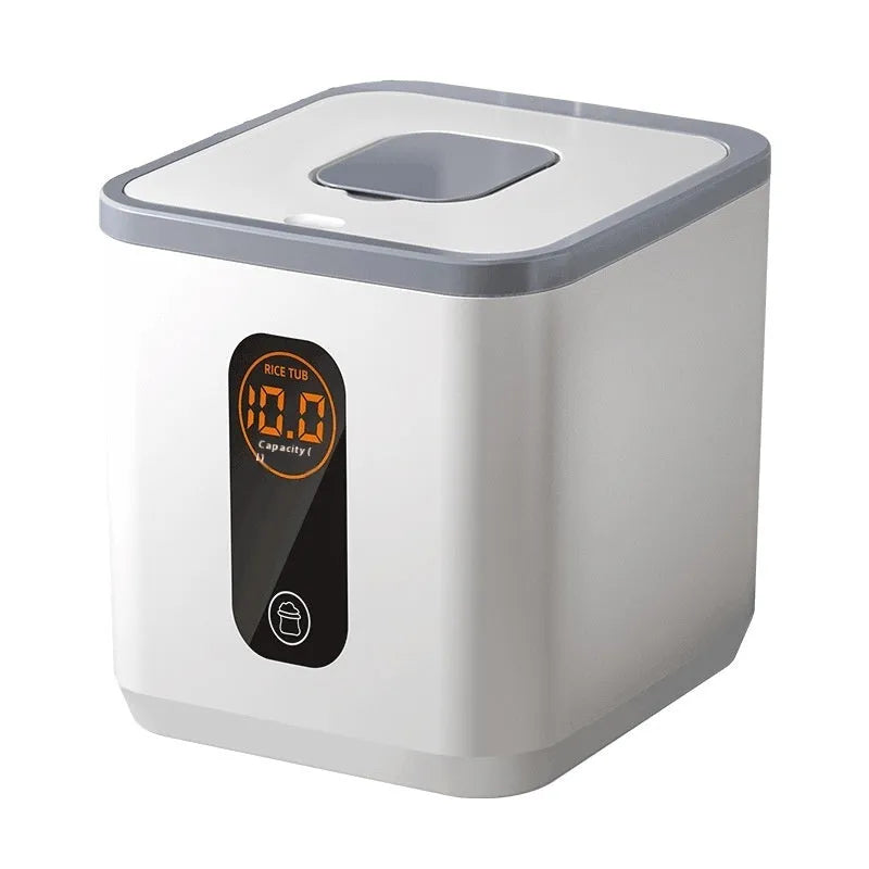 Simple grey plastic rice storage jar with lid and measuring cup for sealed, insect-proof food storage.