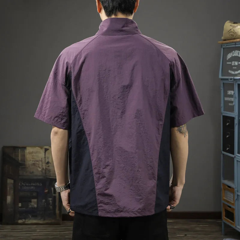 Brown men's half-zip stand collar short-sleeved shirt on a hanger