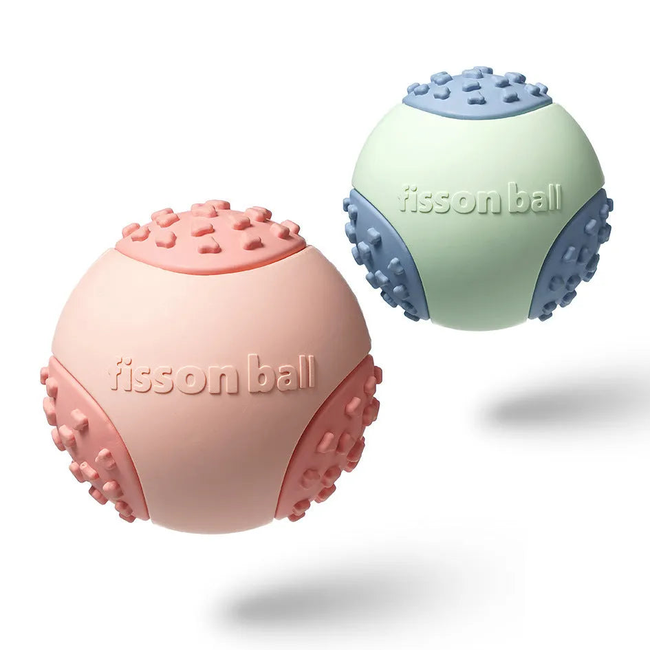 Green and pink 64mm rolling ball dog toy with smart motion technology