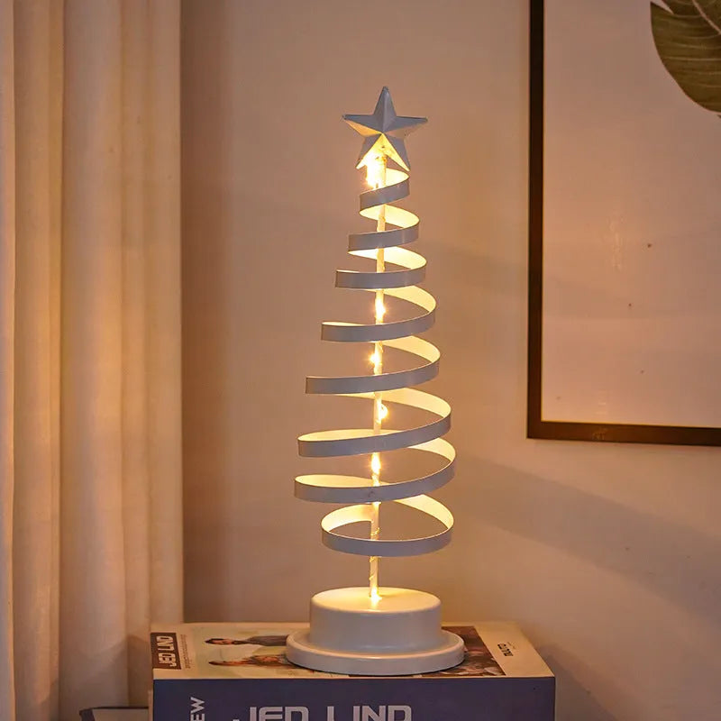 33cm tall metal LED Christmas tree ornament with warm white lights on tabletop