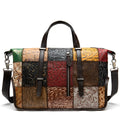 Cowhide leather women's handbag in multi-colour, 36cm long with zip closure and shoulder straps.
