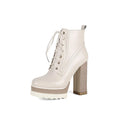Women's black waterproof platform boots with chunky heel and side zipper closure