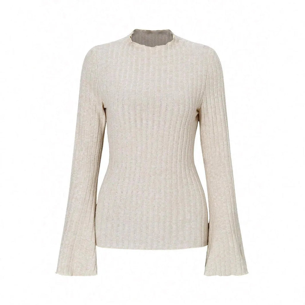 A black long sleeve slim fit top with round neck and lantern sleeves on a model.