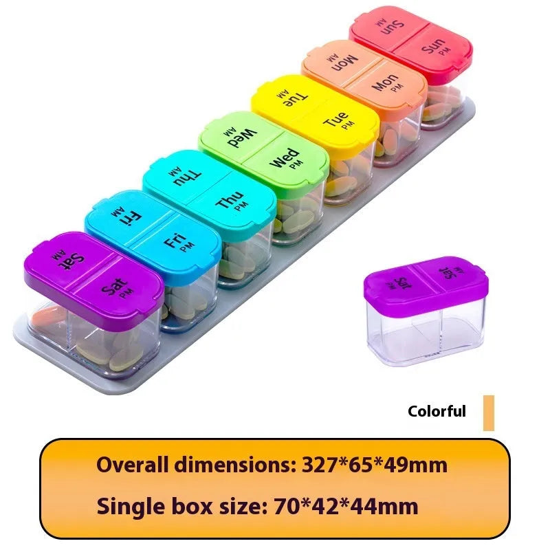 White and rainbow coloured large plastic pill box with 14 removable compartments next to detached single grid.