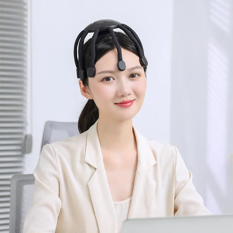 Black electric head massager with multiple claws for scalp vibration therapy